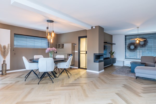 Foto - Te koop: Instapklare gemoderniseerde geschakelde 2 onder 1 kap woning met aanbouw, 3 slaapkamers, garage en een tuin in Voerendaal